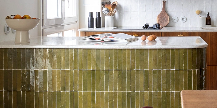 Kitchen Island with green zellige tile decor